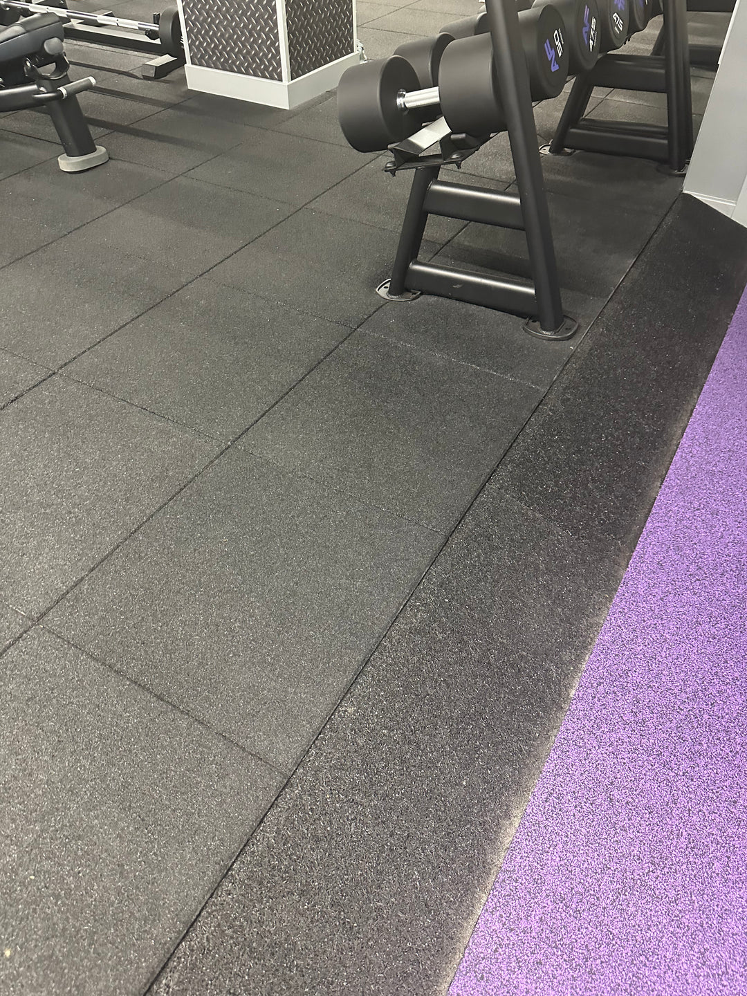 SilentTile 70mm Acoustic Gym Flooring Fitness Interlocking Tile/System in a gym's free-weight area, showcasing durable, soundproof rubber tiles designed for noise reduction and vibration damping, ideal for high-impact fitness environments.