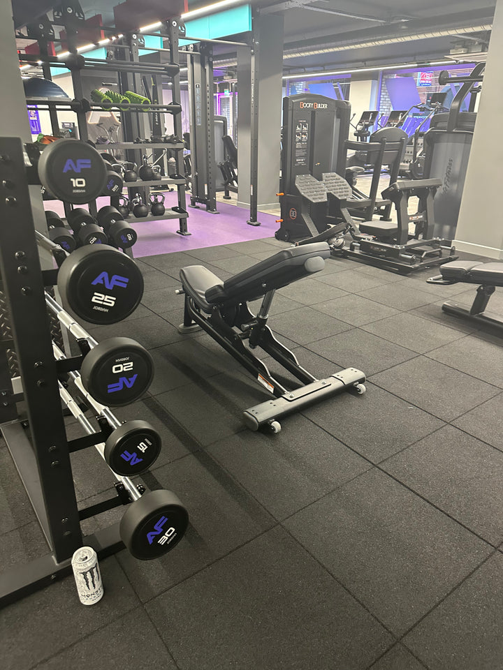 SilentTile 70mm Acoustic Gym Flooring Fitness Interlocking Tile/System covers the gym's floor, providing soundproofing, noise reduction, and vibration damping. Features interlocking design, ideal for weight and cardio areas, aligning with Silentcloud's high-quality standards.