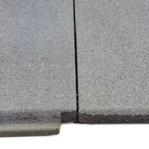SilentTile 70mm Acoustic Gym Flooring features interlocking tiles with a granulated gray surface for noise reduction and vibration damping, ideal for high-impact areas like gyms and sports facilities.